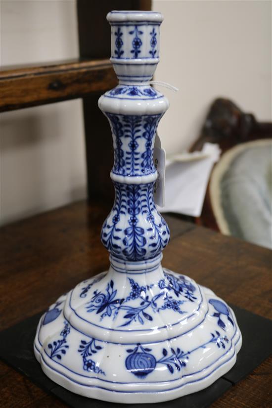 A pair of Meissen onion pattern blue and white candlesticks